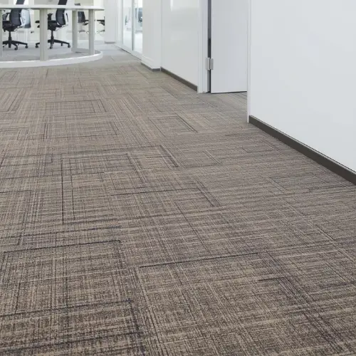 Modern Linear Pattern Modular Carpet Tiles in a Corporate Office Hallway.