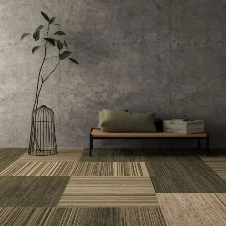 Olive green and khaki striped interlocking carpet tiles in a modern minimalist lounge area with a concrete wall background.